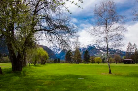 Golf course in Alps Stock Photos