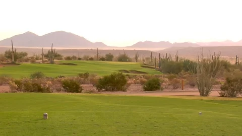 Golf course cactus mountains in background Video stock 125278367