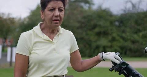Golf course, conversation and friends at field for sport, competition or match Stock Footage 335914108
