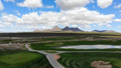 Golf Course Fly Over Toward Mountains Stock Footage 112896388
