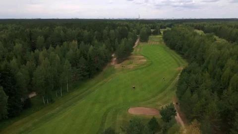 Golf course, golf competition, golfers playing golf, drone footage Stock Footage 252093811