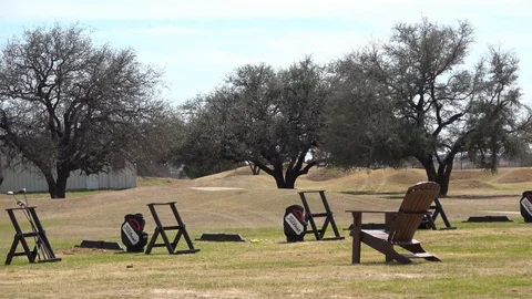 Golf course with golfers. Stock Footage 86992292