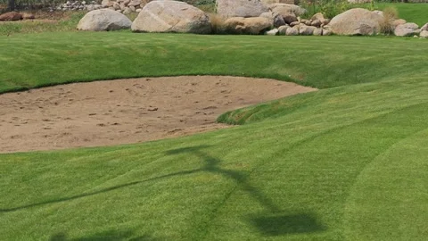 Golf Course Green and Bunkers, howcasing. Stock Footage 307921165