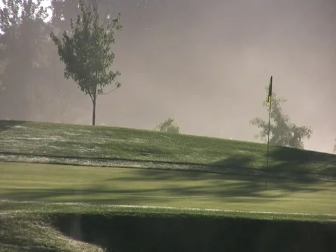 Golf course green by pond Stock Footage 34567512