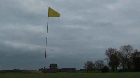 Golf Course Hole, Green Grass &amp; Yellow Flag Video stock 38029930
