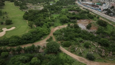 Golf Course in Hyderabad.Tilt up Stock Footage 77339047