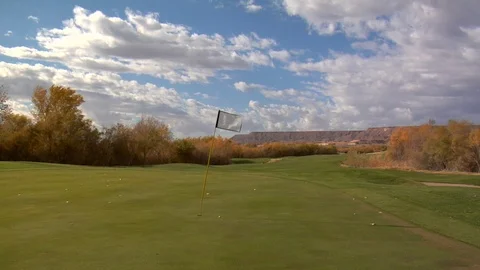 Golf course infront of desert mountains B Stock Footage 125344167