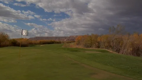 Golf course infront of desert mountains A Stock Footage 125344170