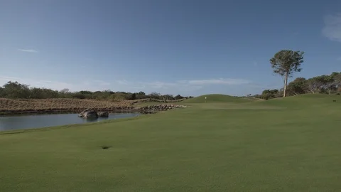 Golf course by lake Stock Footage 113365245