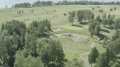 Golf course by the lake 動画素材 168816335