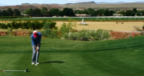 Golf Course Man Chips Ball onto Green Video stock 109179904