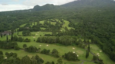 Golf Course on the Merapi Mountainside Stockbeeldmateriaal 347532935