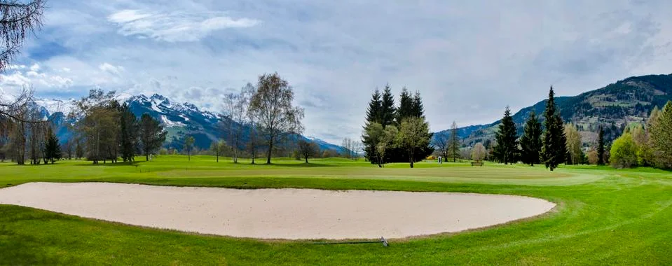 Golf course in mountains Stock Photos