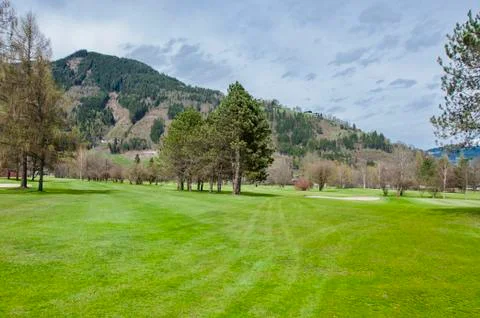 Golf course in mountains Stock Photos