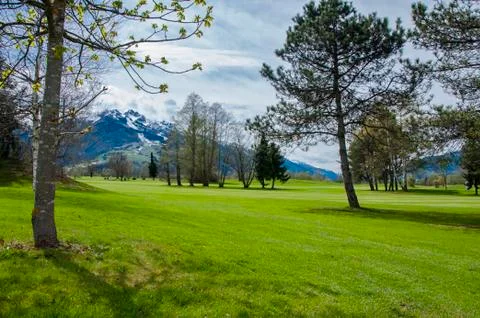 Golf course in mountains Stock Photos