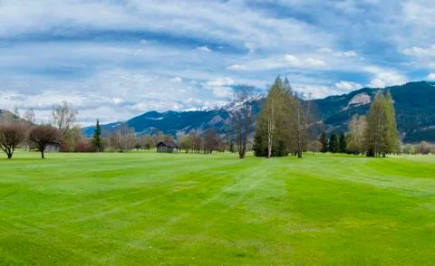 Golf course in mountains Stock Photos