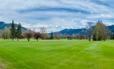 Golf course in mountains Stock Photos