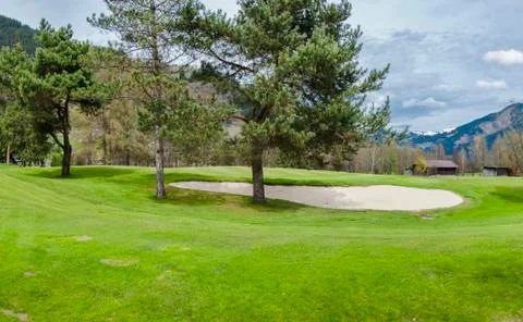 Golf course in mountains Stock Photos