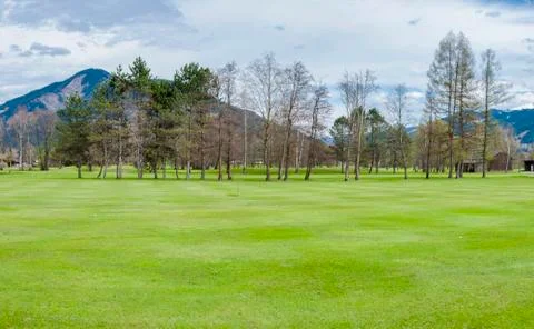 Golf course in mountains Stock Photos