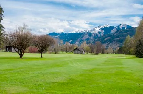 Golf course in mountains Stock Photos