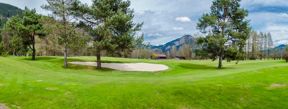 Golf course in mountains Stock Photos