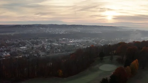 Golf Course Overlooks Small Town USA With River Stock Footage 99010218