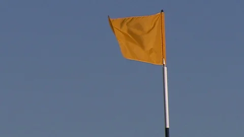 Golf course pin flag. Waving in the wind. cu Stock Footage 102524510