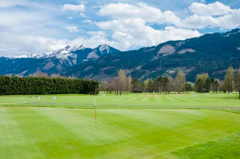 Golf course with players Stock Photos