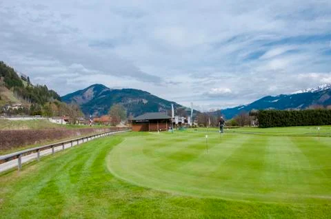 Golf course with players Stock Photos