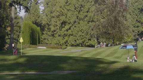 Golf course. Players walking between holes. 스톡 동영상 142599034