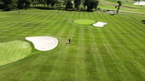 Golf course with several players during the game Stock Footage 239066589
