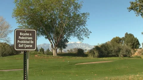 Golf Course with Snowy Mountain in Background Stockbeeldmateriaal 1091312