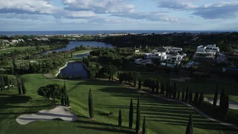 Golf course in Spain next to luxury villas Stock Footage 234447423
