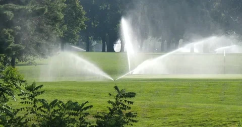 Golf Course Sprinkler - 4k Stock Footage 53501653