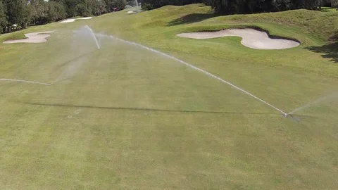 Golf Course sprinklers by drone Video stock 93375419