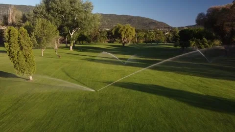 Golf Course Sprinklers Stock Footage 146025272