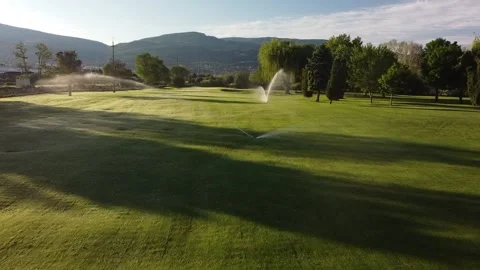 Golf Course Sprinklers Stock Footage 146025373