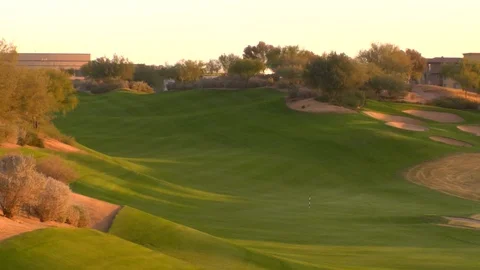 Golf course sun setting magic hour Stock Footage 125278392