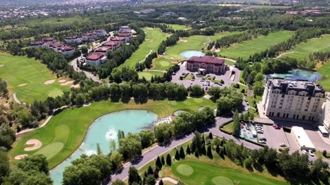 Golf course with a view of the high mountains. Video stock 159559689