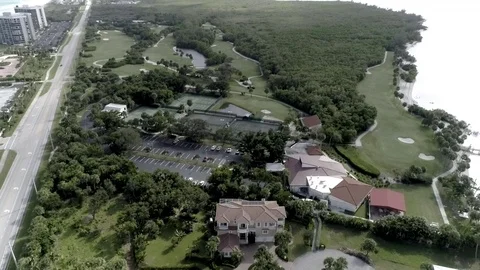 Golf course with water on both sides Stock Footage 103284326
