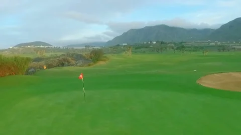 Golf Flag Blowing In Wind On Golf Course Stock-Footage 72965814