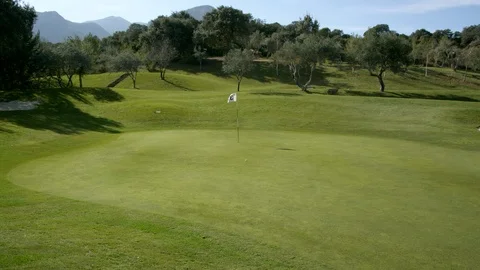 Golf, Golf Course, Putting Green, Dolly Shot, Wide Shot, 10 Seconds Or Greater, Stock Footage 94236674