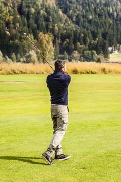 Golf guy making a swing 스톡 사진
