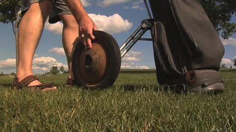 Golf hand cart fix Stock Footage 23848136