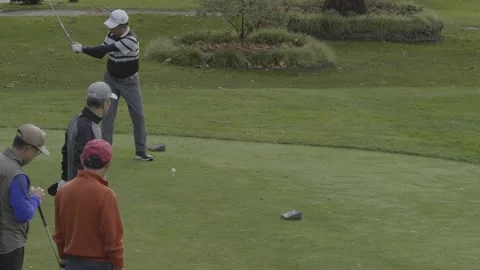 Golf. Hitting ball from a tee. 库存影片 142608334