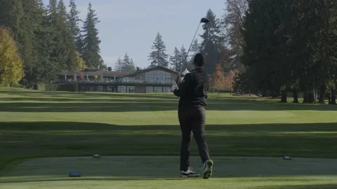 Golf. Hitting ball from a tee (variant). Stockbeeldmateriaal 142596392