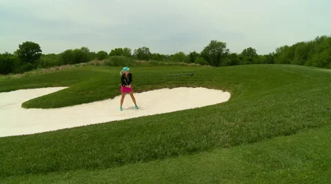 Golf lady in sand bunker Stock Footage 67229956