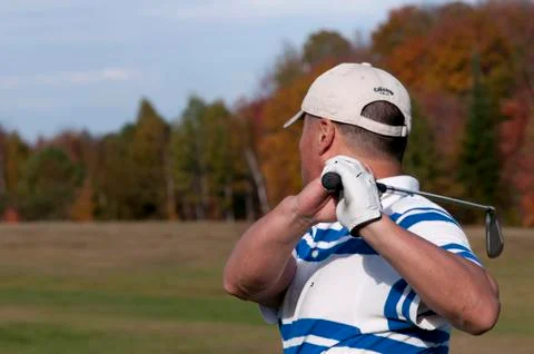 Golf player in action Stock Photos