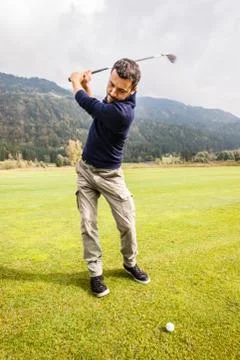 Golf player Charging the shot 写真素材