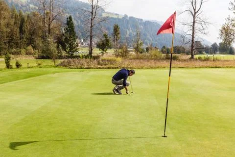 Golf player on the green Stock Photos